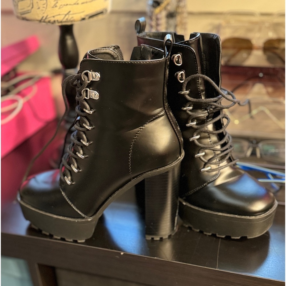 Size 8 forever 21 booties. Only worn one time inside the house. Mint condition